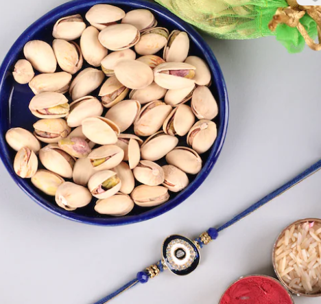 Designer Rakhi with 100 Gm Pistachio Delights